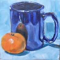Blue mug with mandarin